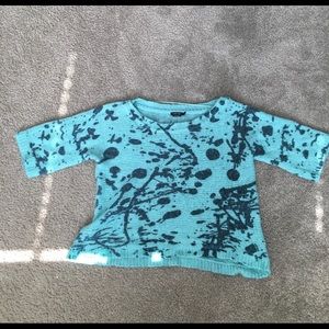 Colorful sweater that can be worn as a statement or in a casual setting